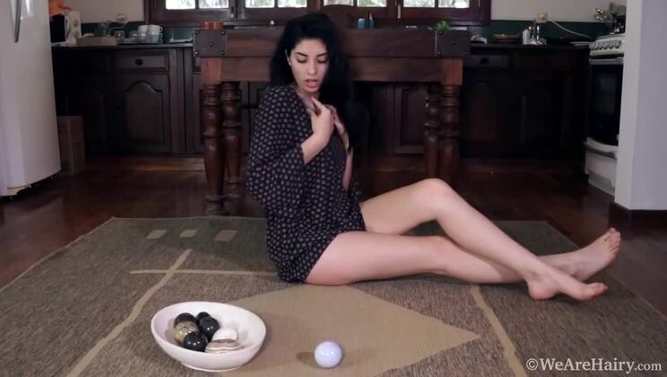[WeAreHairy] - Hairy Ornella rubs stones on her wet slit